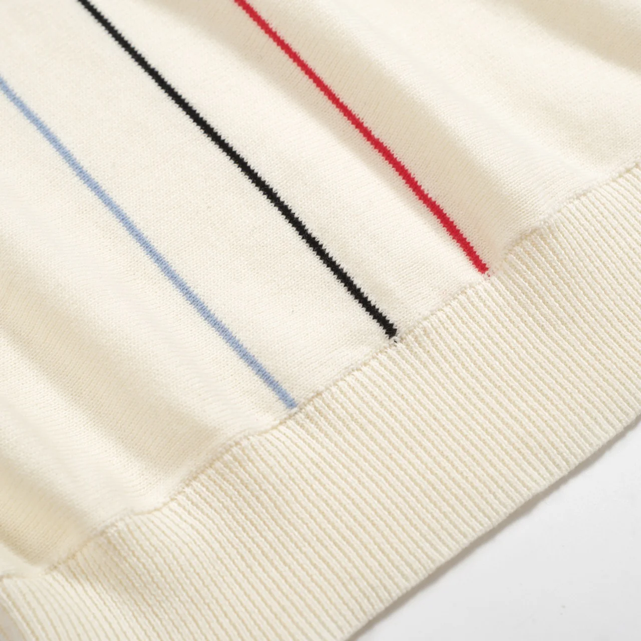 Men’s Vintage 1970s Knit Polo Shirt – Retro Cream with Red, Black & Blue Arrow Graphic - Image 7